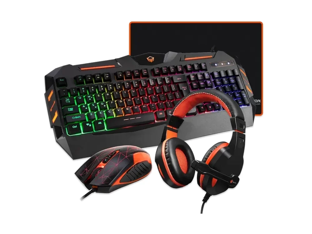 1 Vista frontal del kit gamer 4 en 1 Meetion C500 mostrando el teclado retroiluminado, mouse de 3200 DPI, auriculares y alfombrilla sobre fondo blanco.